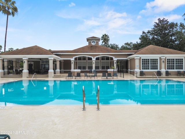 view of pool featuring a patio area