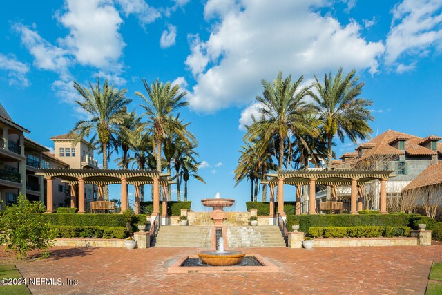 surrounding community featuring a pergola