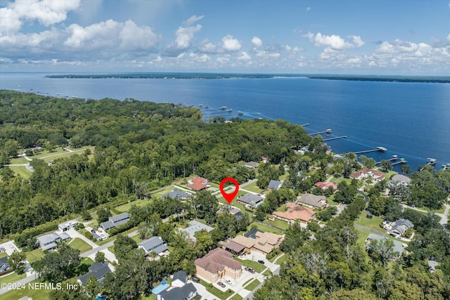 bird's eye view featuring a water view, a residential view, and a view of trees