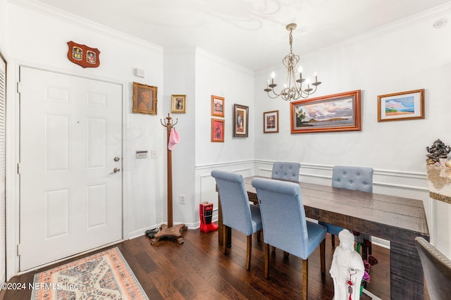 office space with dark hardwood / wood-style floors, an inviting chandelier, and crown molding