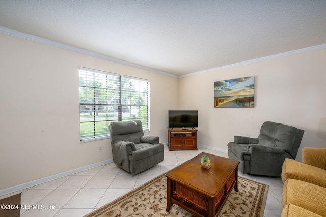 living room with light tile patterned floors, ornamental molding, and a textured ceiling