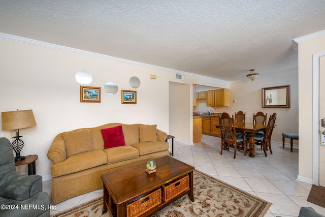 tiled living room with crown molding and a textured ceiling