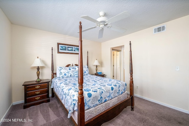 bedroom with a textured ceiling, ceiling fan, and carpet flooring