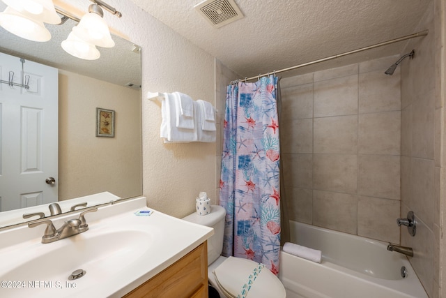 full bathroom with a textured ceiling, vanity, toilet, and shower / bathtub combination with curtain