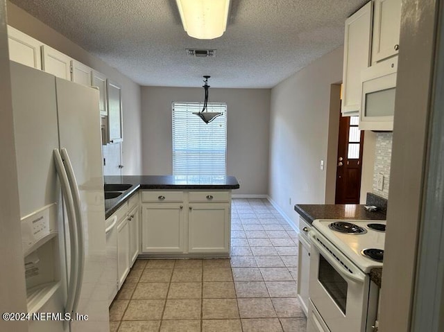 kitchen with white cabinetry, pendant lighting, white appliances, and light tile patterned flooring