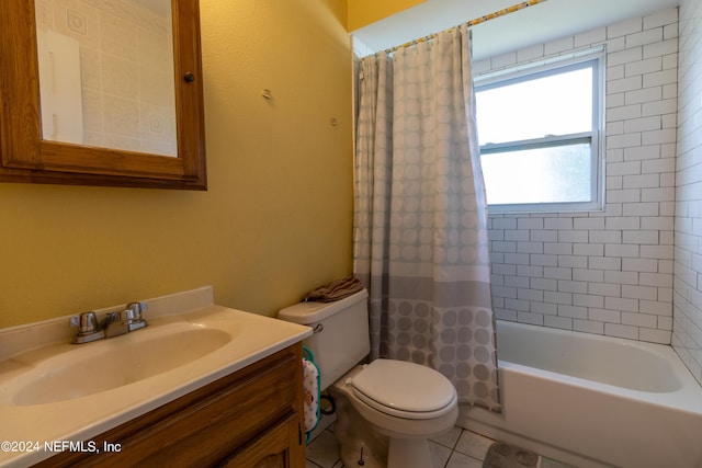 bathroom featuring toilet, shower / tub combo with curtain, and vanity