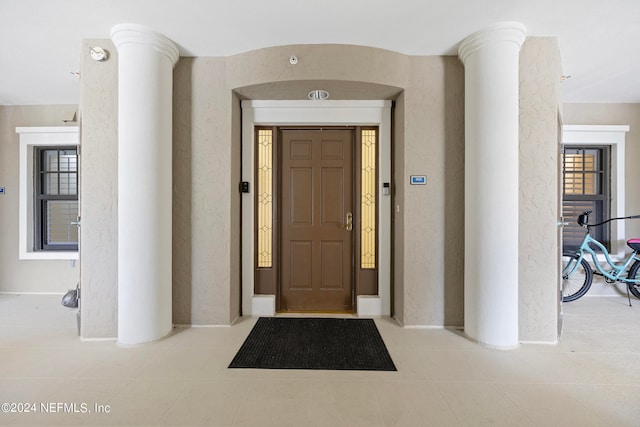 foyer featuring ornate columns