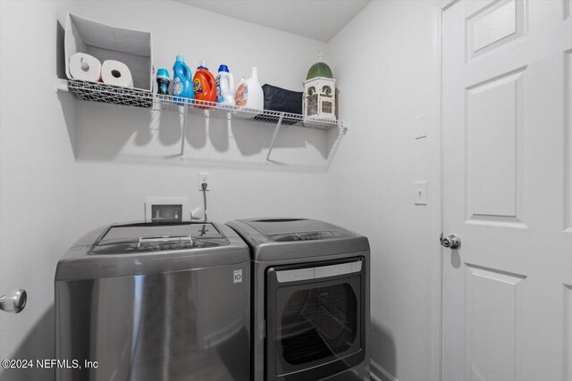 laundry room featuring washer and dryer