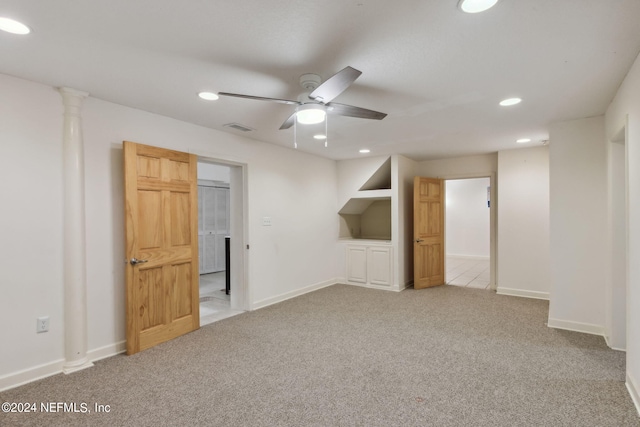 carpeted empty room with ceiling fan