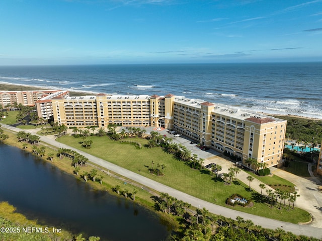 bird's eye view with a water view