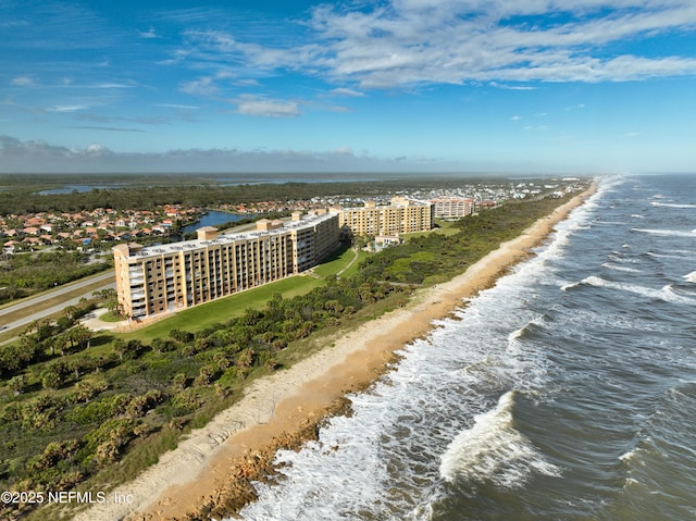 aerial view with a view of the beach and a water view