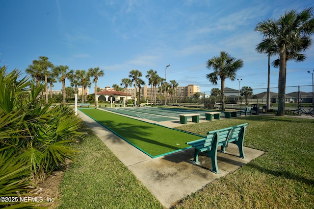 view of community with a lawn