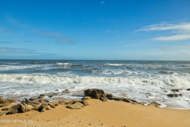 view of water feature with a view of the beach