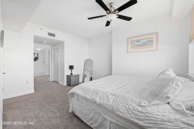 bedroom featuring ceiling fan and light colored carpet