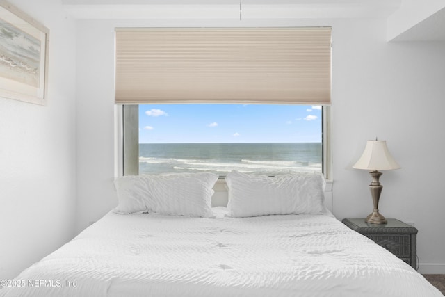 bedroom with a water view