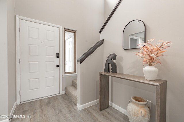 foyer featuring light wood-type flooring