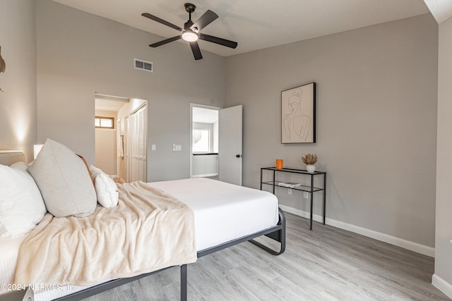 9360 Craven Rd Unit 504, Jacksonville, FL 32257 - bedroom with baseboards, visible vents, multiple windows, and light wood-style floors