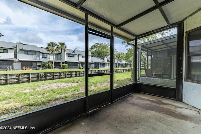 9360 Craven Rd Unit 504, Jacksonville, FL 32257 - unfurnished sunroom featuring a residential view