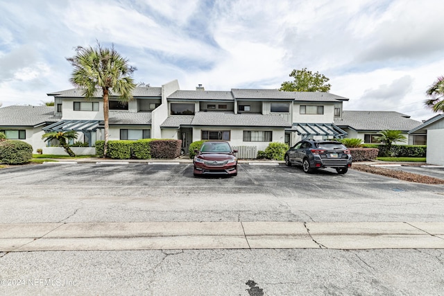 9360 Craven Rd Unit 504, Jacksonville, FL 32257 - view of property featuring a residential view and uncovered parking