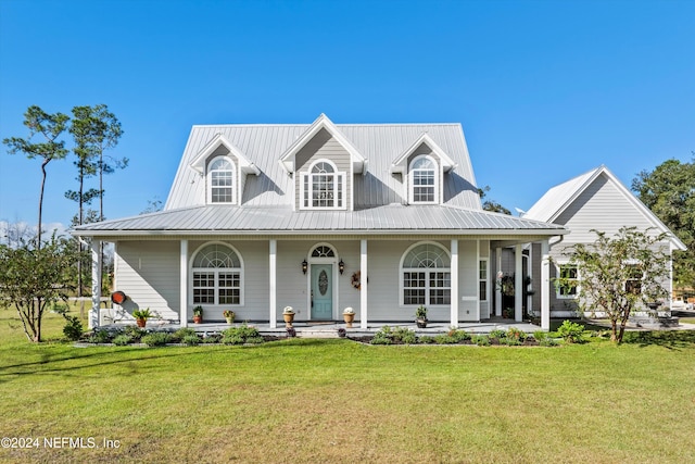 view of front facade featuring a front lawn and covered porch