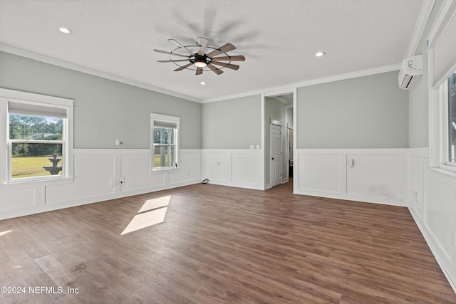 unfurnished room featuring crown molding, a healthy amount of sunlight, dark hardwood / wood-style floors, and ceiling fan