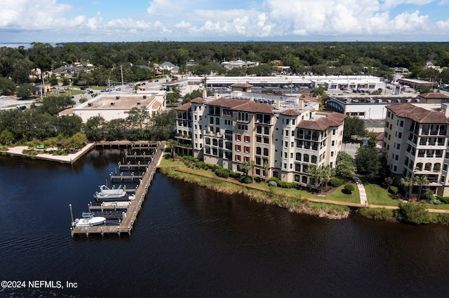 birds eye view of property featuring a water view