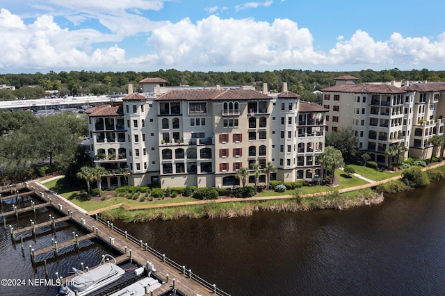 view of building exterior with a water view