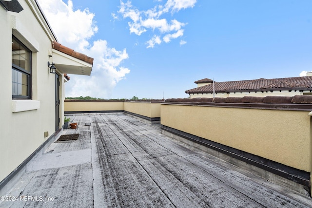 view of patio with a balcony