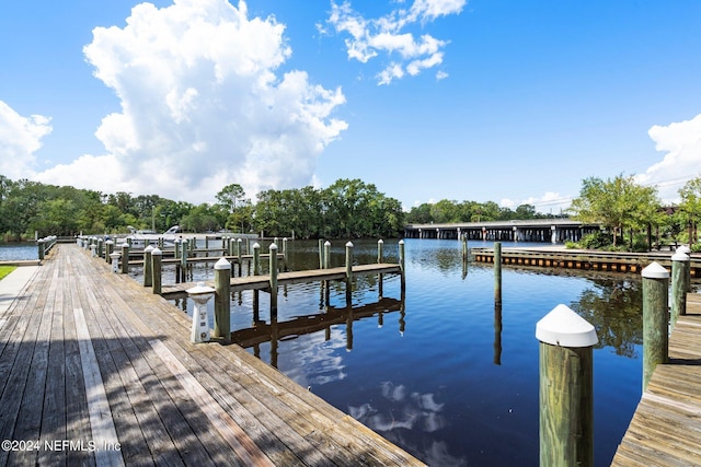 view of dock with a water view