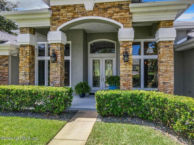 view of exterior entry with french doors