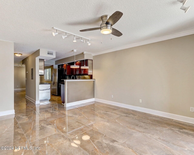 kitchen with ornamental molding, stainless steel fridge, a textured ceiling, rail lighting, and ceiling fan