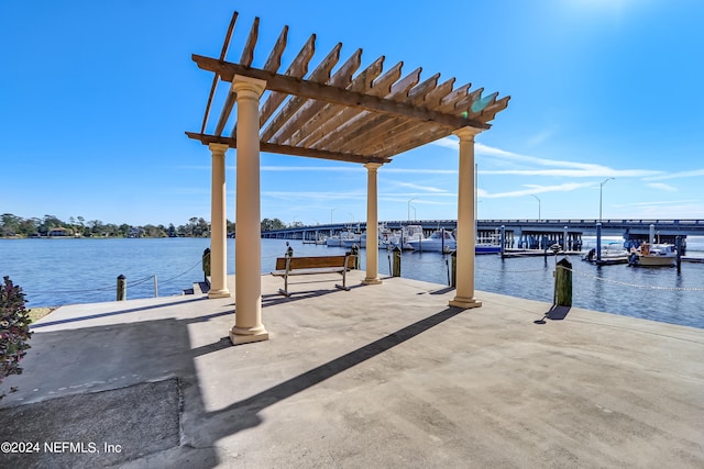 view of dock with a water view