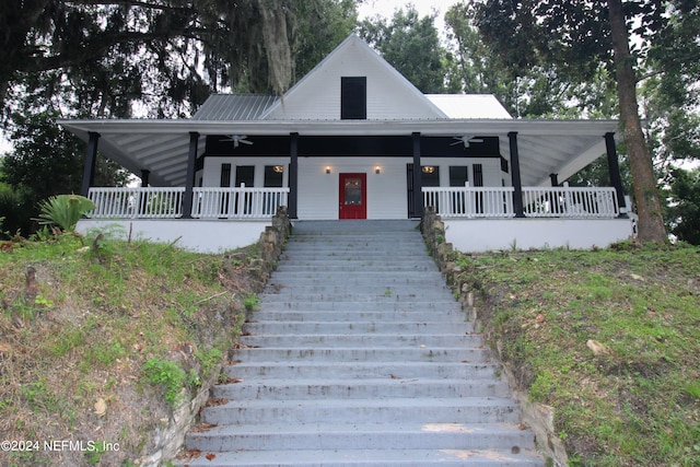 farmhouse inspired home with covered porch