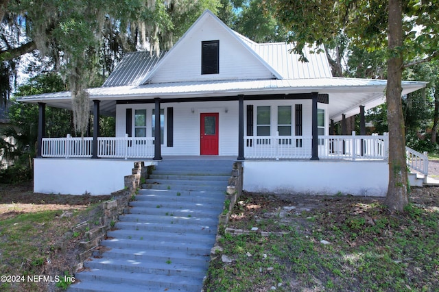 farmhouse-style home with a porch