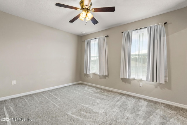 285 Cedar Preserve Ln, Saint Augustine, FL 32095 - carpeted empty room with baseboards, a textured ceiling, and ceiling fan