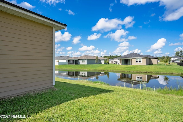 view of yard with a water view