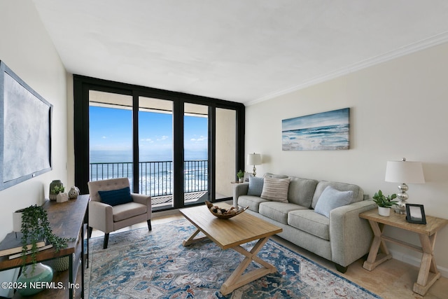 living room with a water view, expansive windows, and crown molding