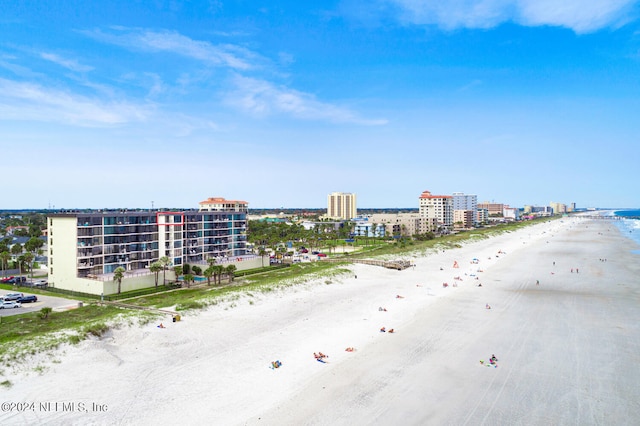 bird's eye view featuring a beach view and a water view