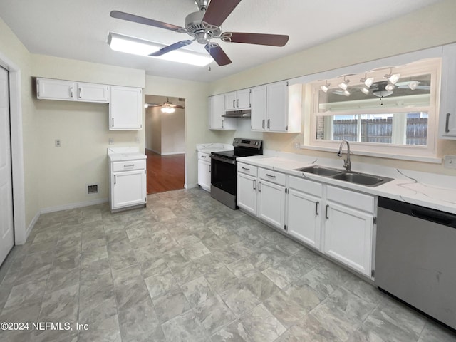 kitchen featuring stainless steel appliances, a ceiling fan, white cabinets, a sink, and under cabinet range hood