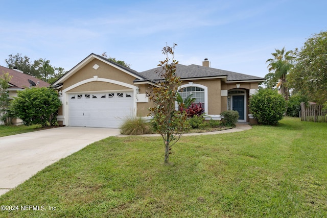 ranch-style home with concrete driveway, stucco siding, a chimney, an attached garage, and a front yard