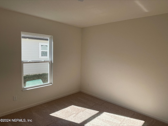 view of carpeted spare room