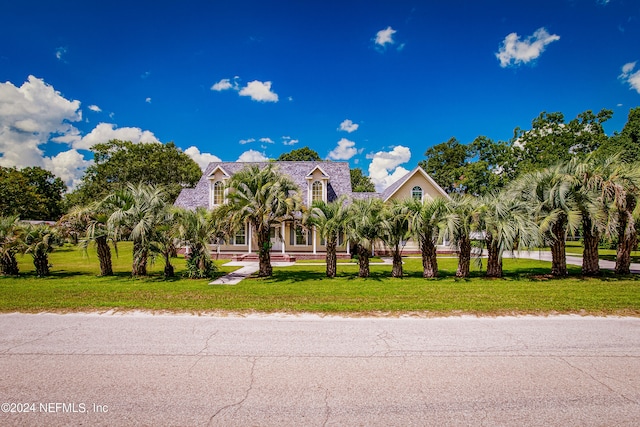 view of front of home with a front lawn