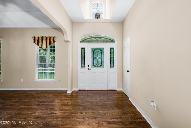 entryway with dark wood-type flooring