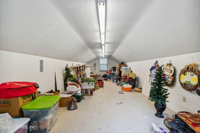 interior space featuring vaulted ceiling