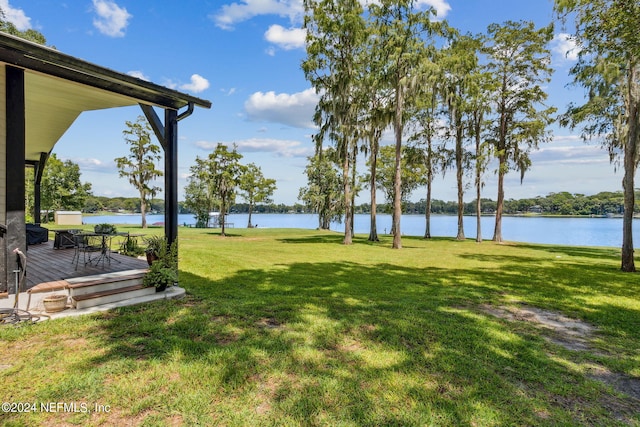 view of yard with a water view