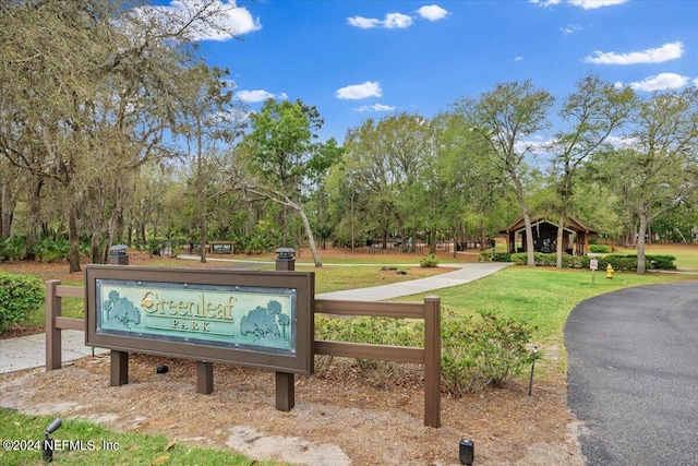 view of home's community featuring a lawn