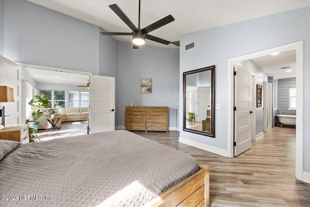 bedroom featuring ceiling fan and hardwood / wood-style flooring