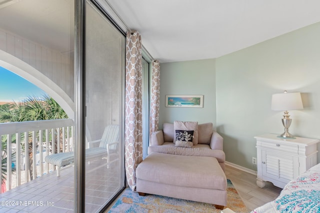 180 Ocean Hibiscus Dr Unit 301, Saint Augustine, FL 32080 - bedroom with baseboards and wood finished floors