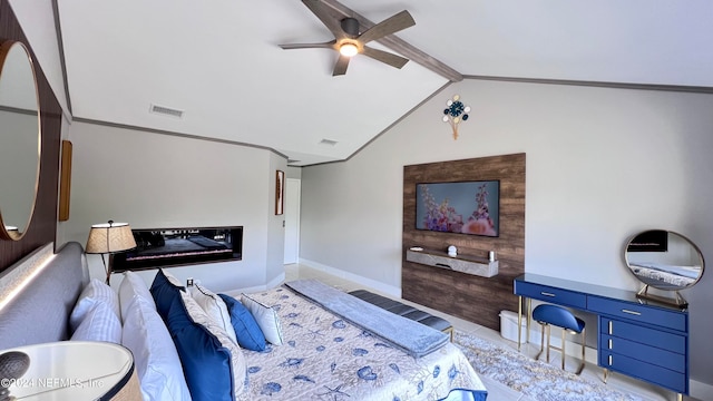 bedroom featuring ceiling fan and lofted ceiling