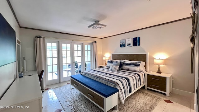 bedroom with french doors, ornamental molding, light tile patterned floors, and access to exterior